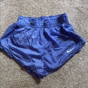 Nike Women's Royal Blue Athletic Running Shorts with White Swoosh